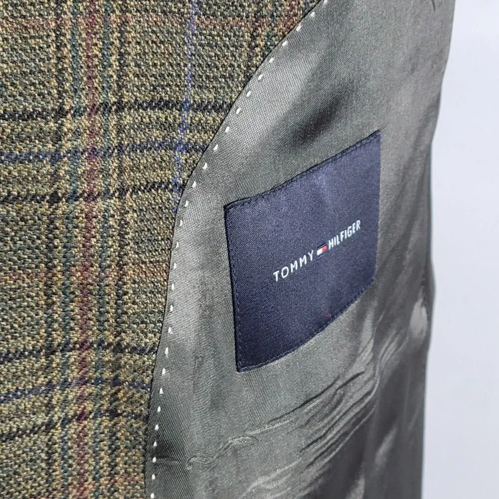 Tommy Hilfiger before completing